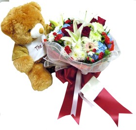 Teddy and bouquet